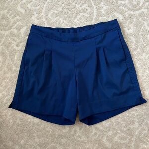 Nike dri-fit women’s shorts gold athletic blue work out M